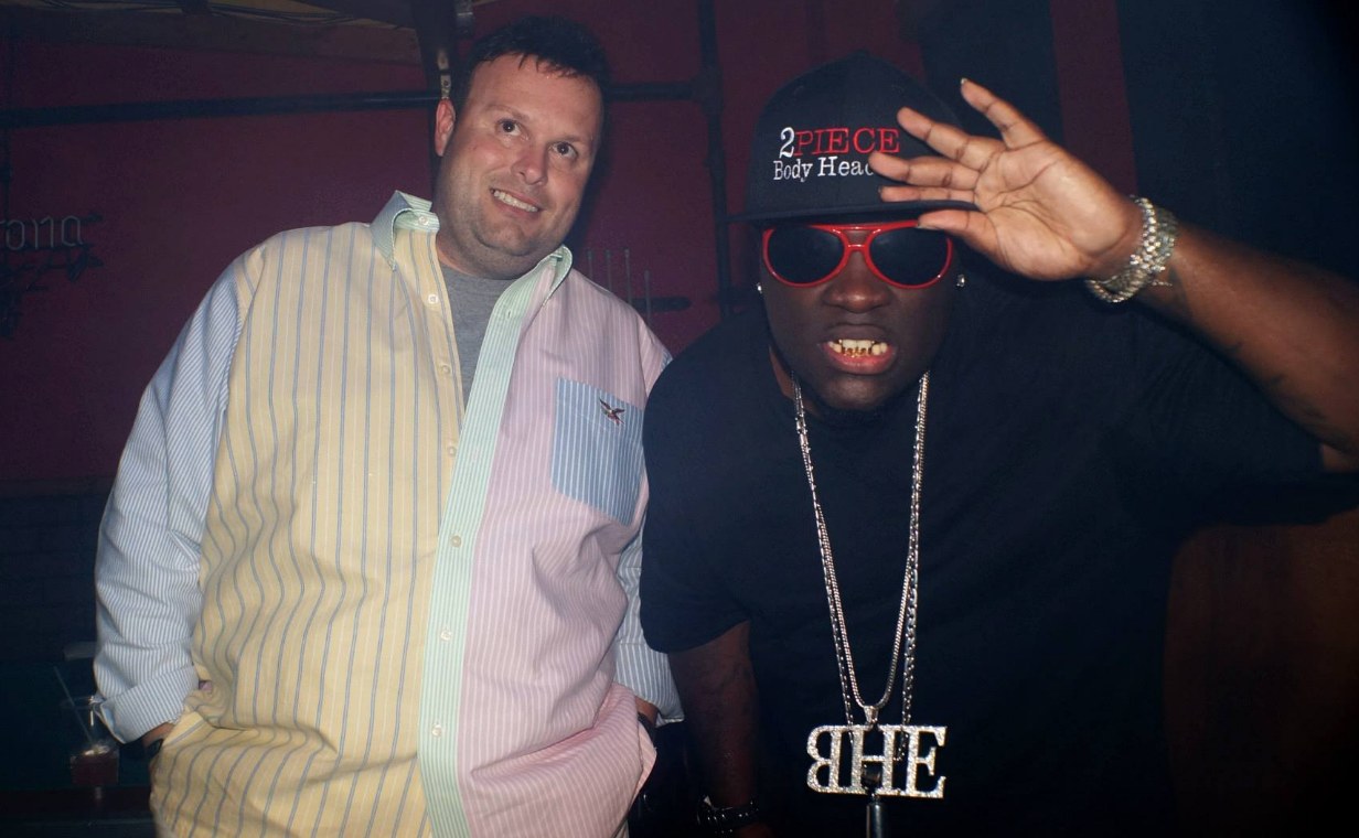 2Piece in a Body Head Entertainment cap posing with a collaborator